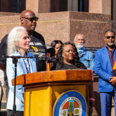 Community members join Dr. Ferrer at the public release of OVP's Gun Violence Prevention Platform